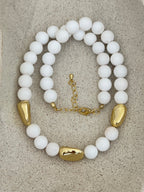 White and gold necklace