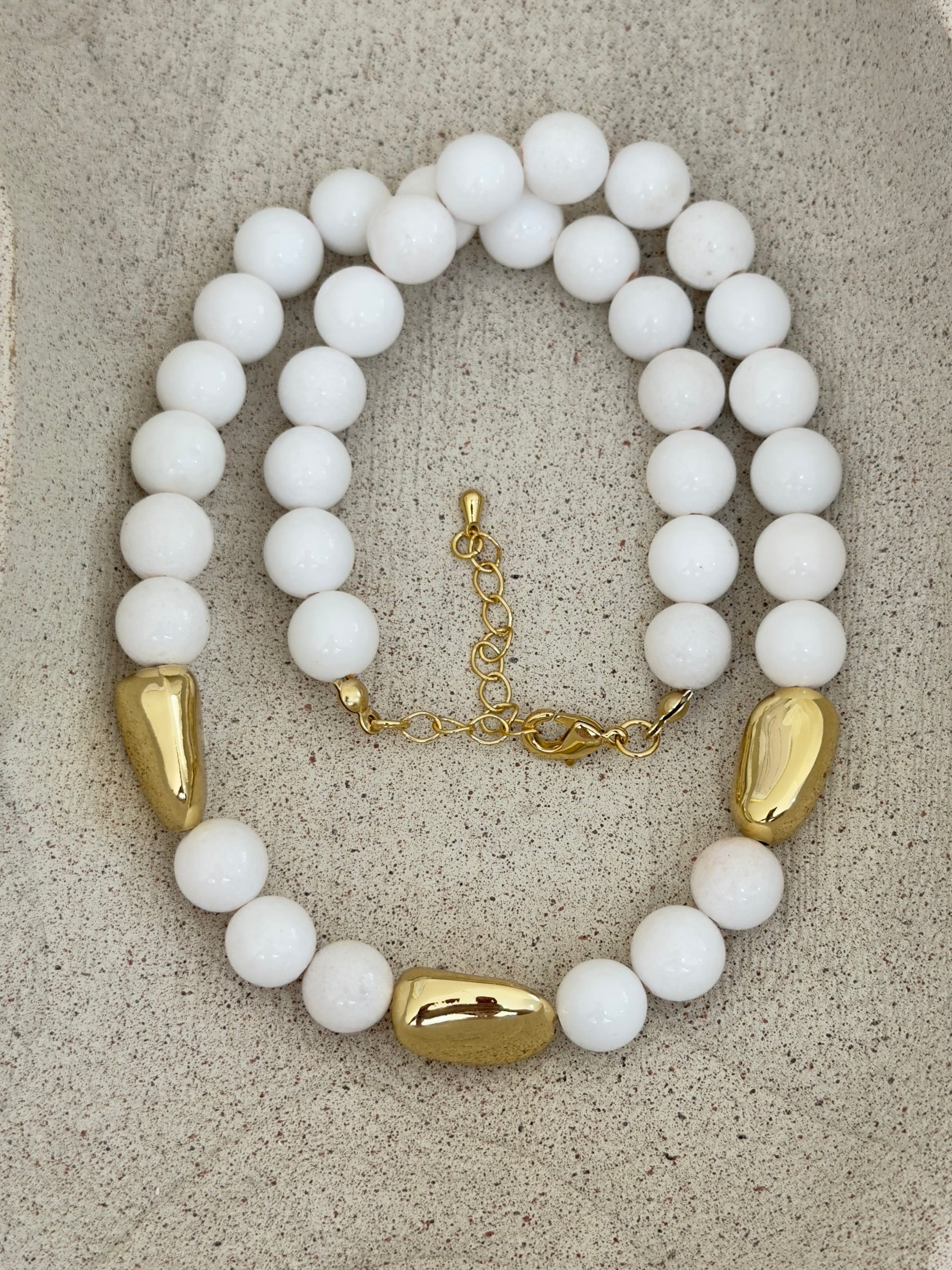 White and gold necklace