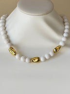 White and gold necklace