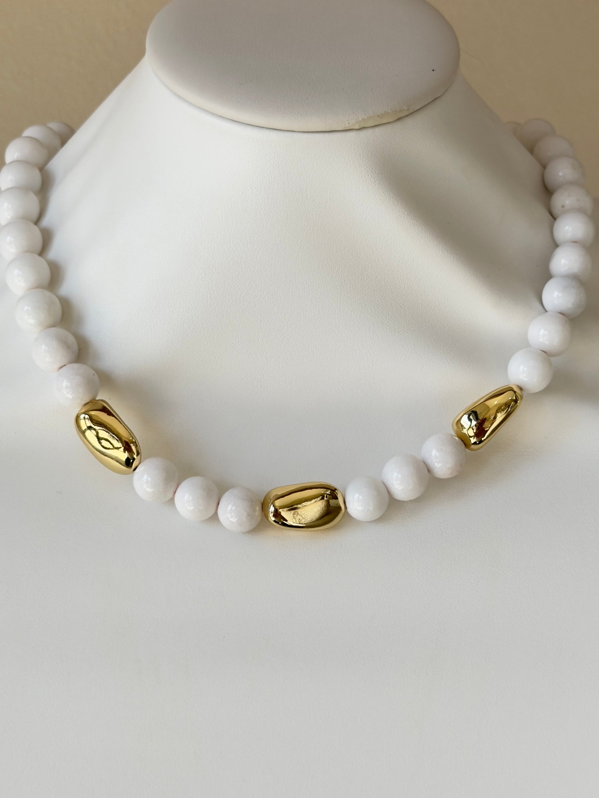 White and gold necklace
