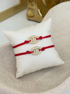 Pulsera hilo rojo y broche de circonia